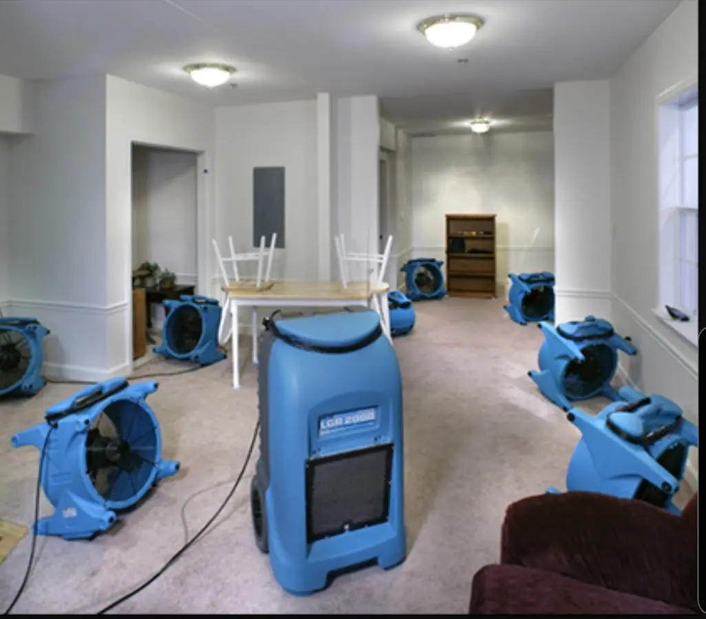 Air movers and dehumidifier setup for Water Damage Restoration in East Aurora